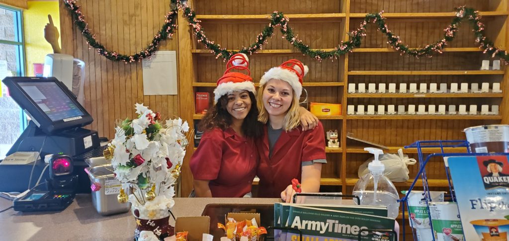 Cashiers with Santa Caps